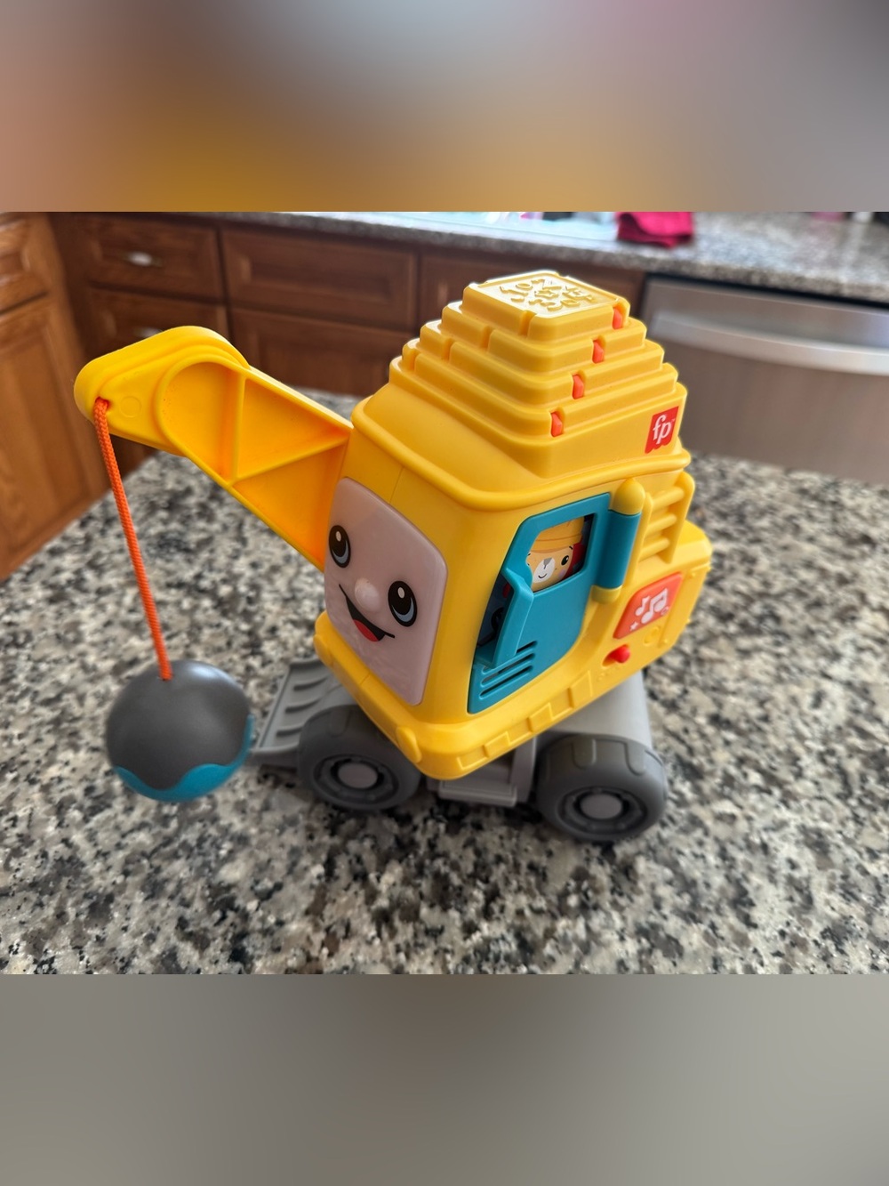 Fisher-Price Yellow and Blue Musical Wrecking Crane Toy